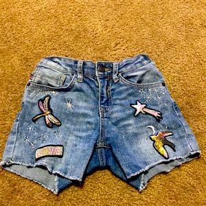 Jean shorts with pictures on them